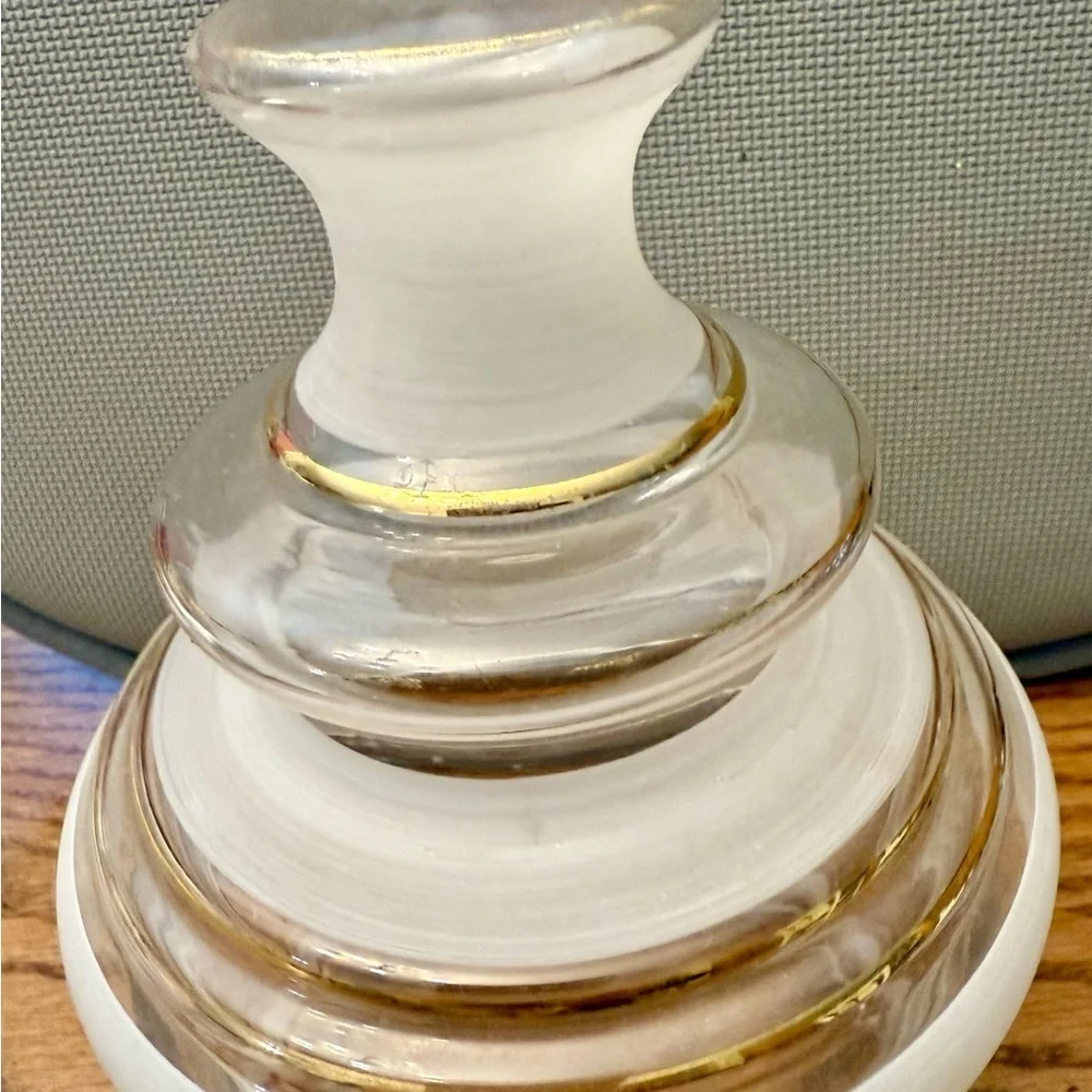 Elegant mid-century clear and frosted glass jar with gold accents.